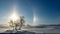 Halo effect on a winter morning. Sunny and shining light, cold weather, very frosty winter day, trees and grass covered with white