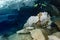 Halocline effect while diving in cenotes cave in Mexico