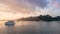Halong bay at sunset in Vietnam, South Asia, and Tourist Junks. Panoramic view. Travel destination and natural background