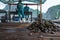 Halong Bay, Vietnam - April 27, 2018: Oysters on the ground of the Pearl Farm with workers in background at Halong Bay.