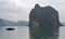 Halong Bay - Vietnam - Large Karsts and small traditional fishing boat