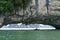 Halong bay in Vietnam, UNESCO World Heritage Site, with tourist rowing boats