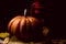 Haloween pumpkin with leafs hazelnuts