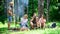 Halt for snack during hiking. Company friends relaxing and having snack picnic nature background. Camping and hiking