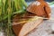 Halved bread with green corn.