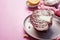 Halved radicchio on plate at pink table background