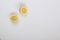 Halved Yellow Lemons Displayed on a White Background