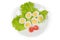 Halves of boiled chicken eggs and tomato, lettuce on dish