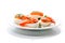 Halves of boiled eggs with pieces of salted salmon on white background