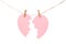 Halves of paper heart hanging on rope against white background.