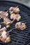 Ham wraped skewers on grill
