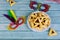 Hamantashen jewish cookies with masks for carnival