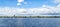 Hamburg Alster Skyline With TV Tower On The Horizon And Sailing Ships On The Water - Panoramic View