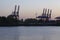 Hamburg - Container gantry cranes in the evening