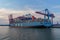 HAMBURG, GERMANY - Aug 08, 2020: Incredible seaside view of the container port in Hamburg at sunset