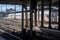 Hamburg, Germany, February 05, 2020: Older passenger train on a roofed track behind steel pillars in the main station of Hamburg