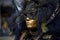 Hamburg, Germany, February 08, 2020: Black and golden mask at the carnival celebration Maskenzauber, that means Magic Masks, a