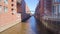 HAMBURG, GERMANY - MARCH 8th, 2014: Famous Speicherstadt warehouse district also called Hafencity with clear blue sky