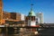 Hamburg, Germany - May 17, 2018: Old beacon lighthouse and red brick building in background, Hafencity - Speicherstadt