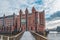 Hamburg, Germany - November 9, 2019: Neo-gothic red brick maritime museum in Hamburg Habor area with clouds