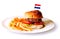 Hamburger with fench fries on a plate in a studio setting isolated on white