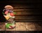 Hamburger ingredients falling down one by one to create a perfect meal. Colorful conceptual picture of burger cooking