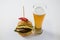 Hamburger with jalapeno by beer glass