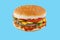 hamburger like in McDonald\\\'s with a beef cutlet on a blue background, studio shooting 1