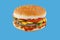 hamburger like in McDonald\\\'s with a beef cutlet on a blue background, studio shooting 2