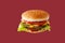 hamburger like in McDonald\\\'s with a beef cutlet on a red background, studio shooting 2
