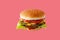 hamburger like in McDonald\\\'s with a beef cutlet on a red background, studio shooting 3