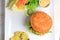 Hamburger with mashed potato with truffles and lettuce salad