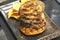 hamburger with nachos on plate on restaurant table.gourmet fast food concept