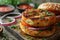 Hamburger With Onions and Tomatoes on Cutting Board