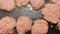 hamburger patties frying on a stove top griddle hot grease and surface food background