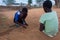 Hamer tribe guys playing a game