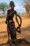 Hamer tribe kids playing with tire