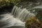 Hamersky creek with waterfalls in Luzicke mountains in color autumn day