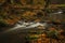 Hamersky creek with waterfalls in Luzicke mountains in color autumn day