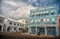 Hamilton, Bermuda - March, 20, 2016: architecture and street turning. Houses architecture on city street on cloudy sky