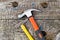 Hammer carpenter on wooden background. Joinery concept