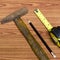 Hammer measuring tape and pencil