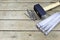 Hammer, Nails And Folding Ruler On Wooden Plank