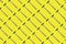 Hammer pattern on a yellow background. hammers are repeated many times