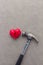 Hammer smashes red heart