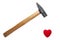A Hammer with Wooden Handle Ready to Break, Crush Red Heart Isolated on White Background. Minimalist Healthcare, Heart attack risk