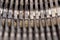 Hammers with letters, numbers and punctuation. Internal structure of the old Soviet typewriter close-up