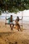 Hammock on the beach Krabi Thailand, couple in swing on Ao Nang beach Thailand Krabi