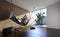 Hammock hanging from the ceiling in modern home