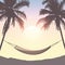 Hammock between palm trees summer holiday design